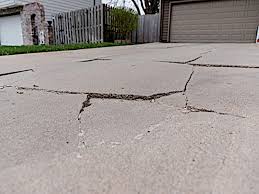 Tearing Out a Structurally Shattered Driveway in East Dallas
